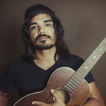 Lee Coulter with guitar